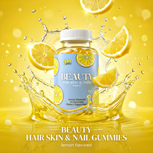 Bottle of 'Beauty Hair Skin & Nails' gummies with lemon slices and water splash on a yellow background